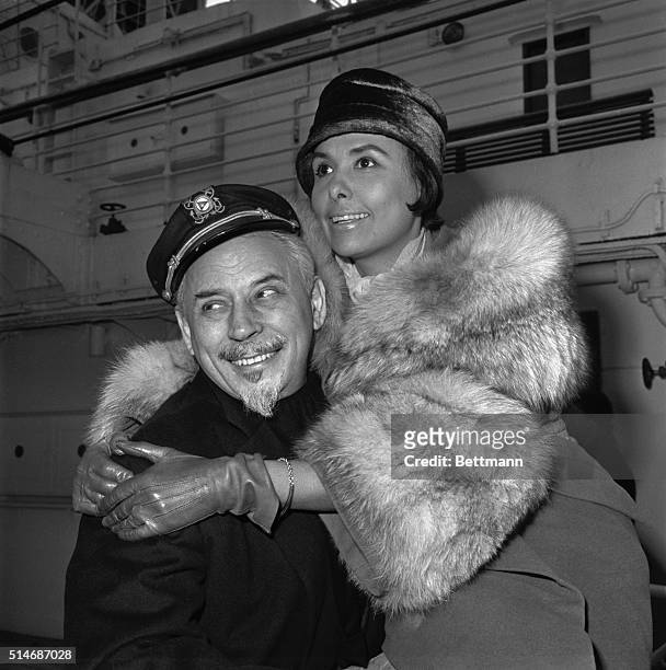 Lena Horne, singer, with her husband, Lennie Hayton, bandleader, sailing for Europe on the Liberte.