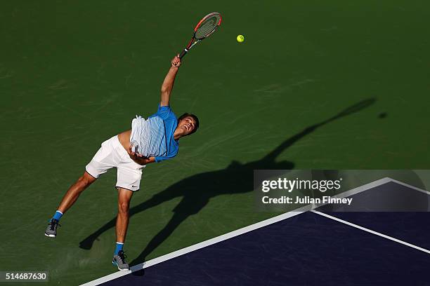 Taylor Fritz of USA serves to Frances Tiafoe of USA during day four of the BNP Paribas Open at Indian Wells Tennis Garden on March 10, 2016 in Indian...