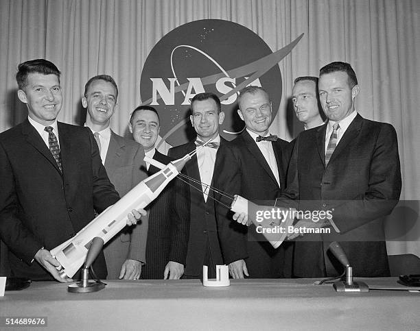 Washington, DC: At a press conference, the seven test pilots chosen to train for the honor of being the first Americans in space are shown with...