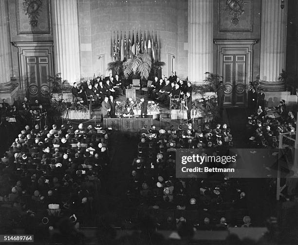 Washington, D.C.: THOUSAND AT TREATY SIGNING. General view in the departmental auditorium as Secretary of State Dean Acheson made the opening address...