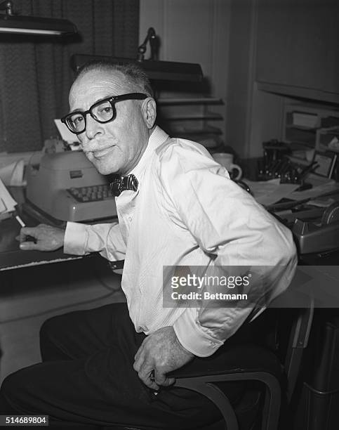 Los Angeles, CA: Dalton Trumbo, blacklisted by the movie industry as one of the "unfriendly ten" witnesses after House UnAmerican Activities...