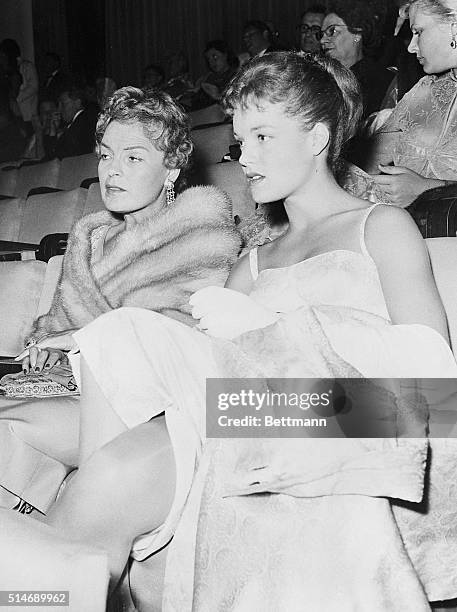 Austrian movie actress Romy Schneider and her mother, stage and film actress Magda Schneider , attend a showing of the film "Eye for an Eye" at the...
