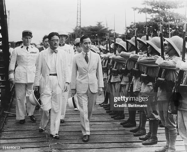 Haiphong, Indo-China: Hajime Matsumiya , Japan's special envoy to French Indo-China, shown in company of French officials and Rokuro Suzuki ,...