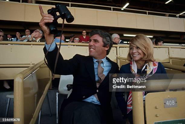 Hollywood, CA: Burt Bacharach, composer, and wife Angie Dickinson, film star, attend race at Hollywood Park, where their horse, Apex II is running.