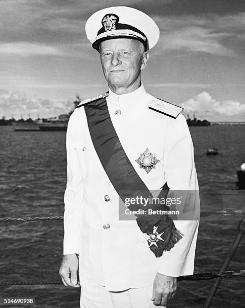 Guam: Fleet Admiral Chester W. Nimitz, commander-in-chief of the U.S. Pacific fleet, is shown on the deck of the HMS Duke of York, flagship of the...