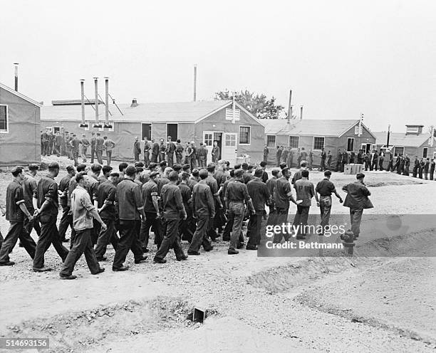 Camp Beckinridge, KY: Some of the 2,000 German prisoners of war housed at Camp Beckinridge are shown marching to the mess hall at mealtime. German...