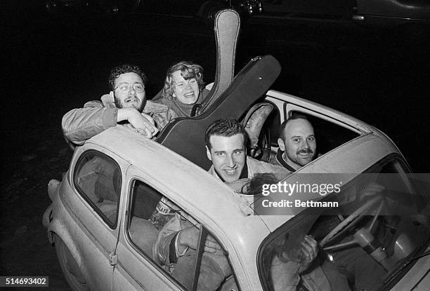 Festive residents of Greenwich Village make their way to night court to act as character witnesses for some accused rioters. They ride in a small...