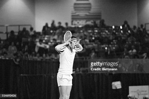 Second ranked tennis player John McEnroe criticizes a linesman's call by sticking out his tongue and making faces during a match against Eliot...