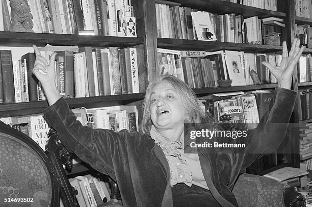 Betty Friedan, women's liberation movement pioneer and author of The Feminine Mystique, raises her hands in the air to make a point. October 23, 1981