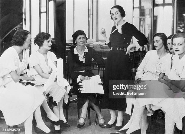 English socialite, Lady Pamela Smith , standing beside French fashion designer Coco Chanel , at the Salons Haute Couture at 31, rue Cambon in Paris....