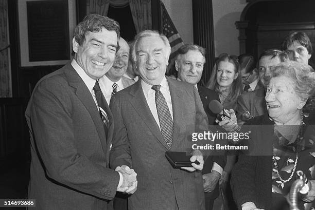 Walter Cronkite who makes his final broadcast 3/6 as anchor amn for "The CBS Evening News," is congratulated by his replacement Dan Rather, after...