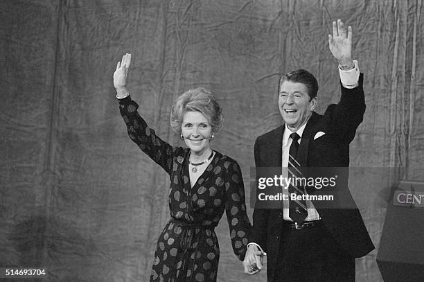 President-elect Ronald Reagan and his wife, Nancy, wave to supporters in Los Angeles after President Jimmy Carter conceded that Reagan had won the...