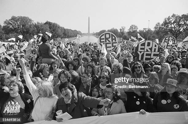 Large crowd of women cheers a speaker at the Lincoln Memorial, during a rally for passage of the Equal Rights Amendment.