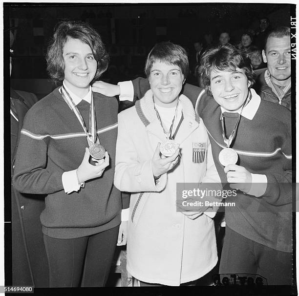 The three women's giant slalom winners show off their medals at the Innsbruck Winter Olympics of 1964.