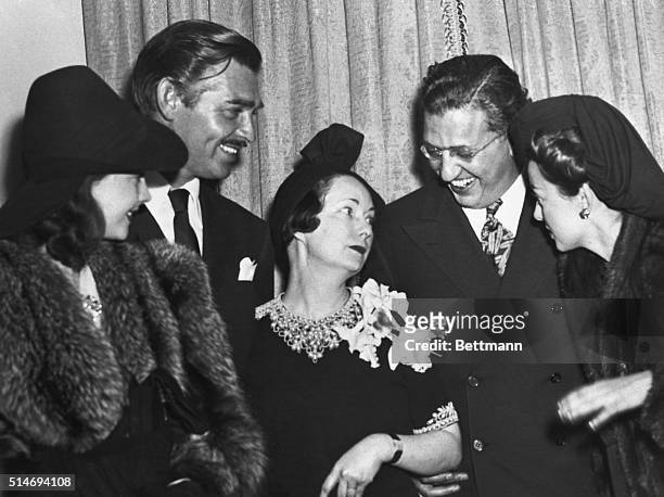 Margaret Mitchell, author of Gone With the Wind, speaks with cast member and David Selznick, the producer. Vivien Leigh, who played Scarlett O'Hara;...