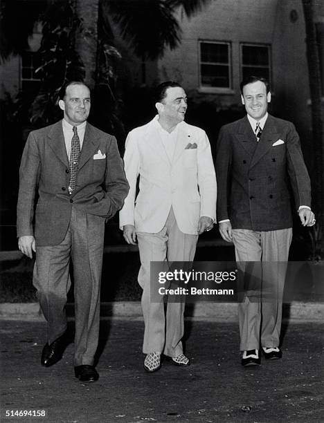 Miami, Florida: J. Edgar Hoover combines business with pleasure on a recent trip to FL. He is shown with two of his Aides, Guy Hottell, special agent...