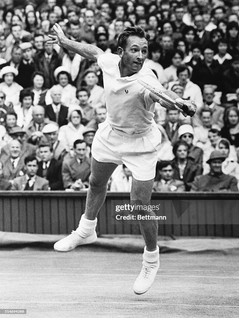 Champion Laver Reaching For Return