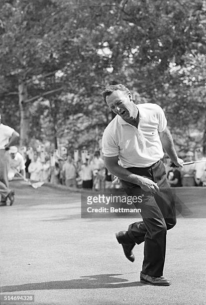 Golfer Arnold Palmer shows his displeasure with missing a putt on the 8th hole at the U.S. Open golf tournament in Brookline, Massachusetts. June 23,...