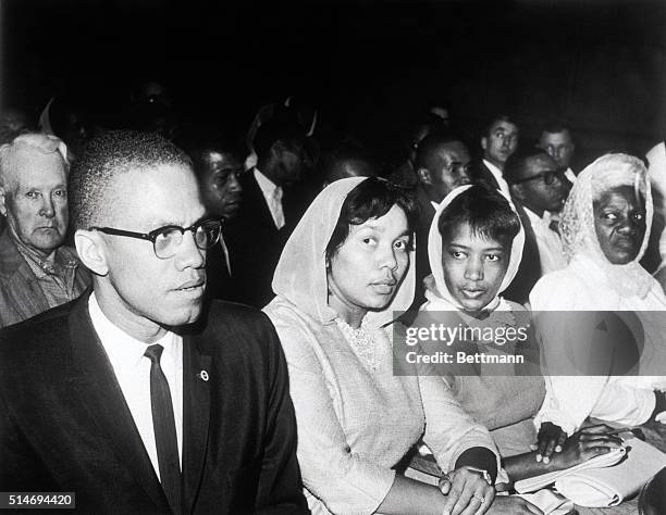 Black Muslim leader Malcolm X attends the trial of fourteen fellow Black Muslims in Los Angeles.