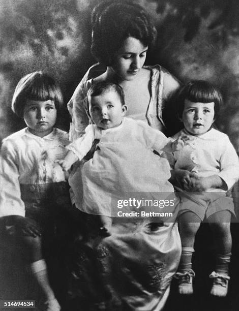 Rose Kennedy sits with three of her young children: Joseph, Jr., Rosemary, and Jack.