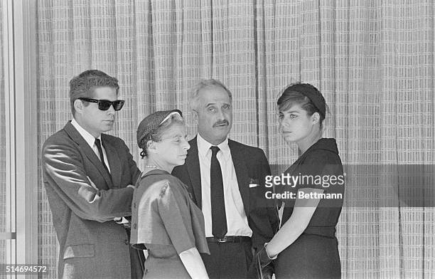 Marilyn Monroe's psychiatrist Dr. Greenson, with his wife and children, at Monroe's funeral in 1962.