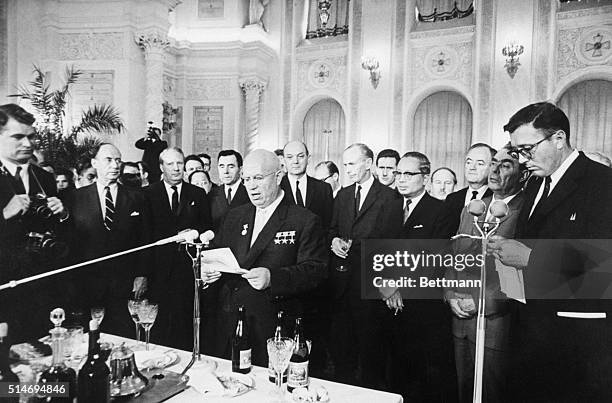 Soviet Premier Nikita Khrushchev speaks at the signing of the Nuclear Test Ban Treaty in 1963, surrounded by dignitaries from the Soviet Union,...