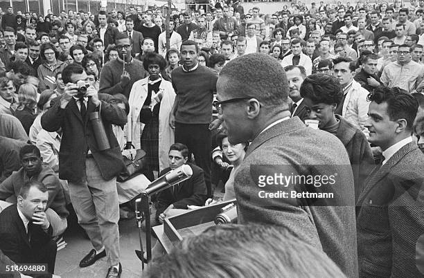 Black Muslim leader Malcolm X speaks to a crowd at the University of Hartford in Connecticut. The talk was moved outdoors when attendance at the talk...