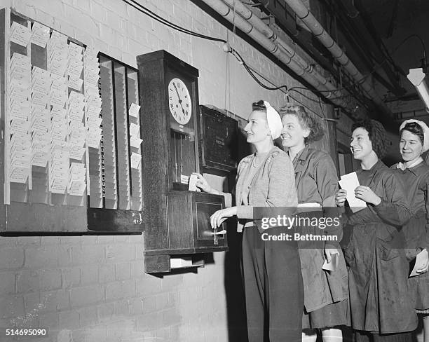 American factory worker Mary Uglianitza punches out at the English factory where she works during a job swap with a British counterpart.