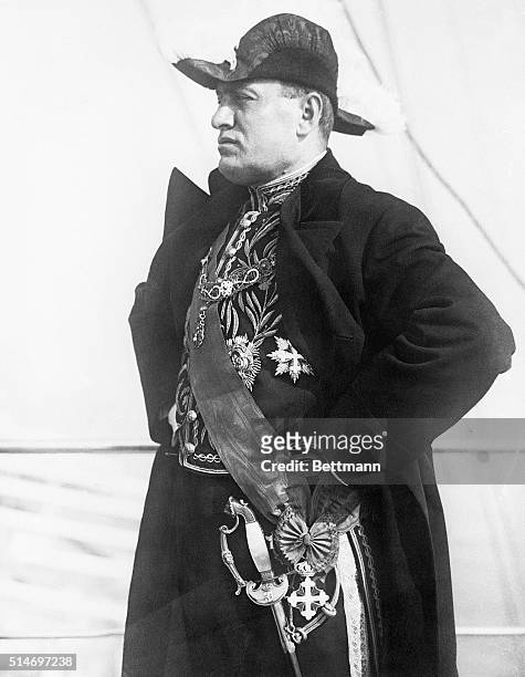 Italian premier Benito Mussolini arrives in Genoa for a visit.