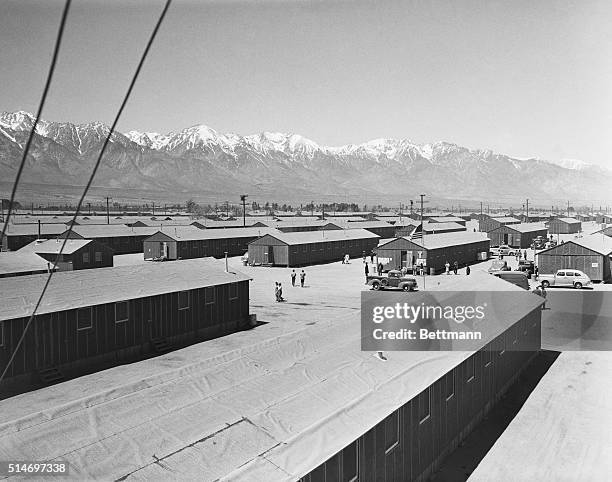 Manzanar, CA: With houses as far as the eye can see, this long shot shows how the camp has grown in the last few months. Tall peak in the back ground...