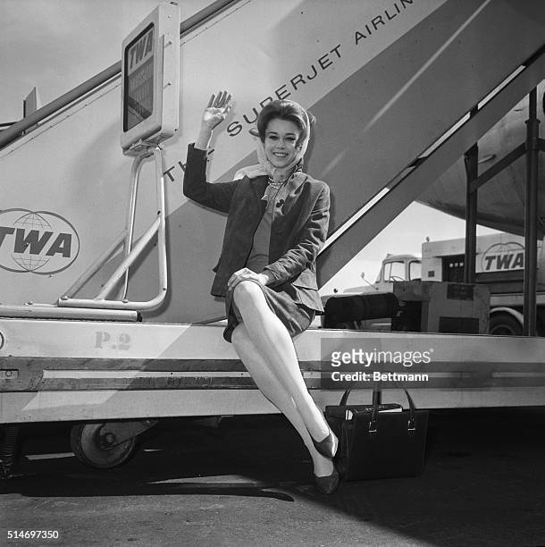 Jane Fonda prepares to board a TWA plane bound for Hollywood to star the Columbia picture Walk on the Wild Side.