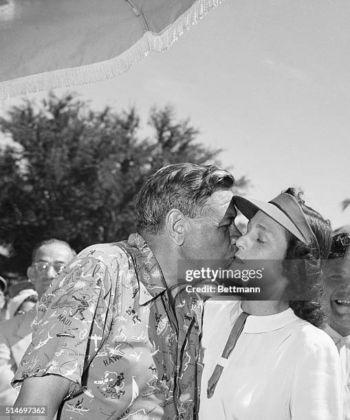 Coral Gables, FL: Babe meets Babe- Babe Didrikson Zaharias enjoys a moment of clowning with another great "Babe" of sports, Babe Ruth, as they greet...