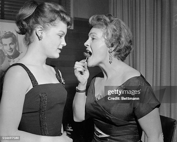 Austrian actress Romy Schneider attends a cocktail party with her mother, stage and film actress Magda Schneider, in the penthouse at Walt Disney...