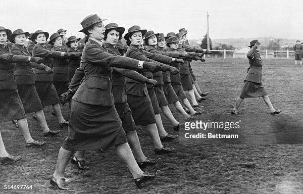 Melbourne, Australia: Members of the A.W.A.S. , counterpart of America's WAACS, shown in a snappy marching formation during a review held at a signal...