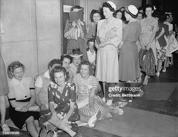 Greensboro, NC: Women lineup to buy nylon stocking seized from the black market.