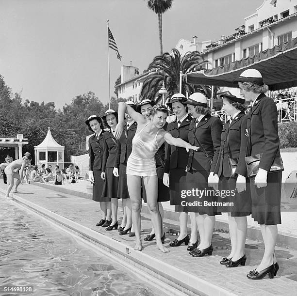 Los Angeles, CA: Esther Williams, former National Swimming Champion and now an MGM featured player was invited by the U.S. Coast Guard to demonstrate...