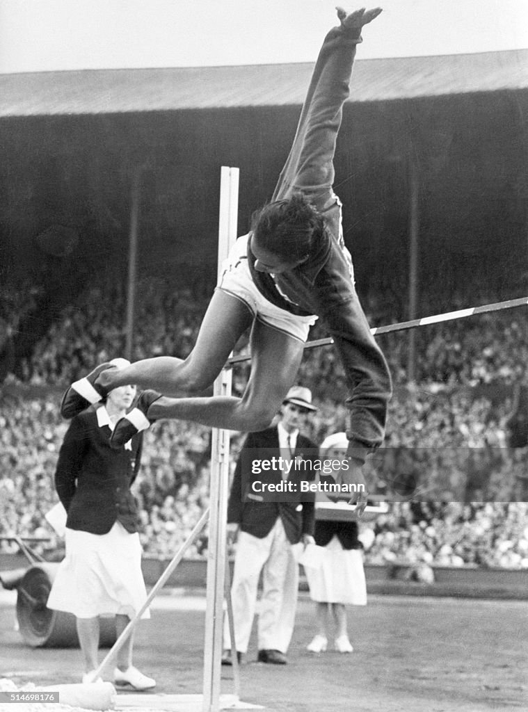 Alice Coachman Competing in Olympic High Jump Event