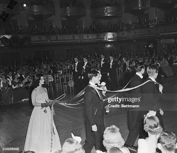 The season's number one debutante, Miss Brenda Frazier, drives her "steeds" in the quadrille of coaches during the debutantes cotillion of the velvet...