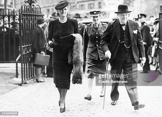 England: Photo shows Mr. And Mrs. Churchill with their daughter Mary arriving at the Abbey for the National Day of Prayer today.