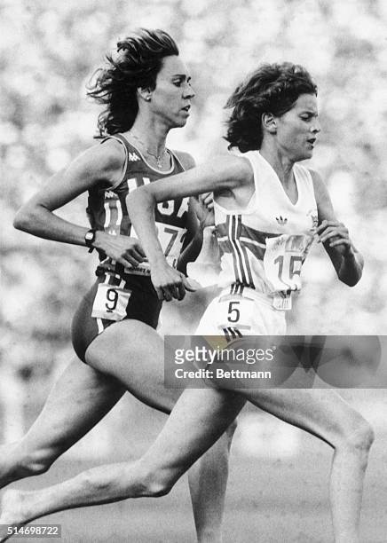 Los Angeles, California: Zola Budd, leads America's Mary Decker by a small margin approximately one half lap before Decker was tripped and Budd was...