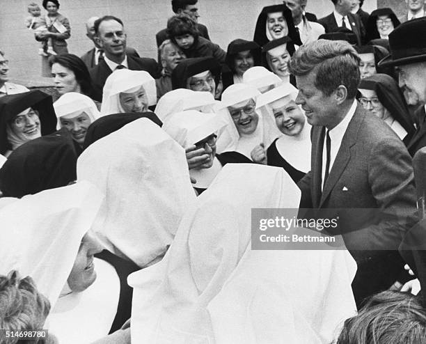 Nuns from the Loreto Convent surround President John F. Kennedy when he visits Wexford on June 27, 1963. A third cousin of the president, Mother...