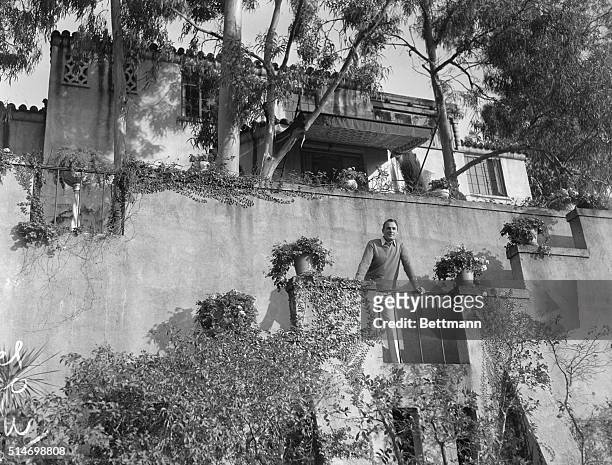 Beverly Hills, CA: Randolf Scott outside Beverly Hills home which he shares with Cary Grant.