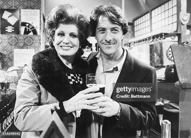 Dustin Hoffman, in England for the opening of Tootsie, visits with Patricia Phoenix on the set of "Coronation Street", a long-running British...