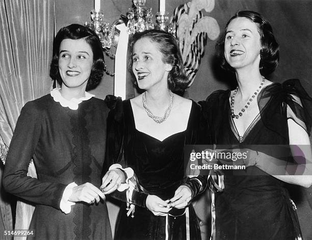 Pictured at the dinner given in their honor by Prince Serge Obolensky at the St. Regis here are the three popular Cushing Sisters, daughters of Dr....