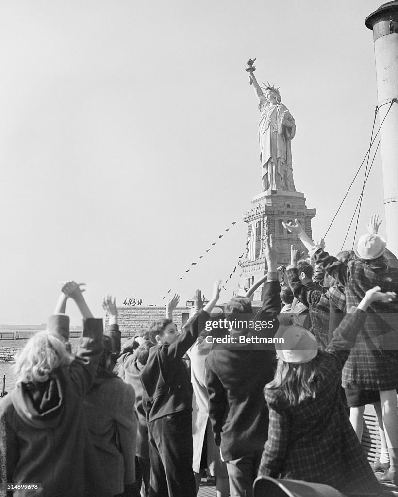 Children Waving to Statue of Liberty