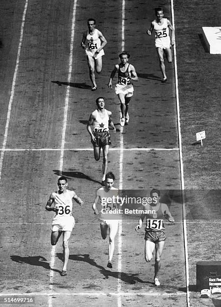 London, England: Here's a birdseye view of the finish of the 800-meter semi-final race at the Olympics at Wembley Stadium. Marcel Hansenne of France...