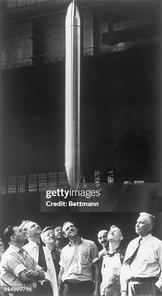 Westinghouse Electric workers examine an 800-pound time capsule that will be buried beneath the Westinghouse exhibit at the 1939 World's Fair for...