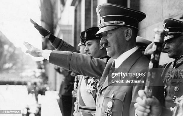 Berlin, Germany: The Fuerer and Count Ciano giving salute from Chancellory balcony.