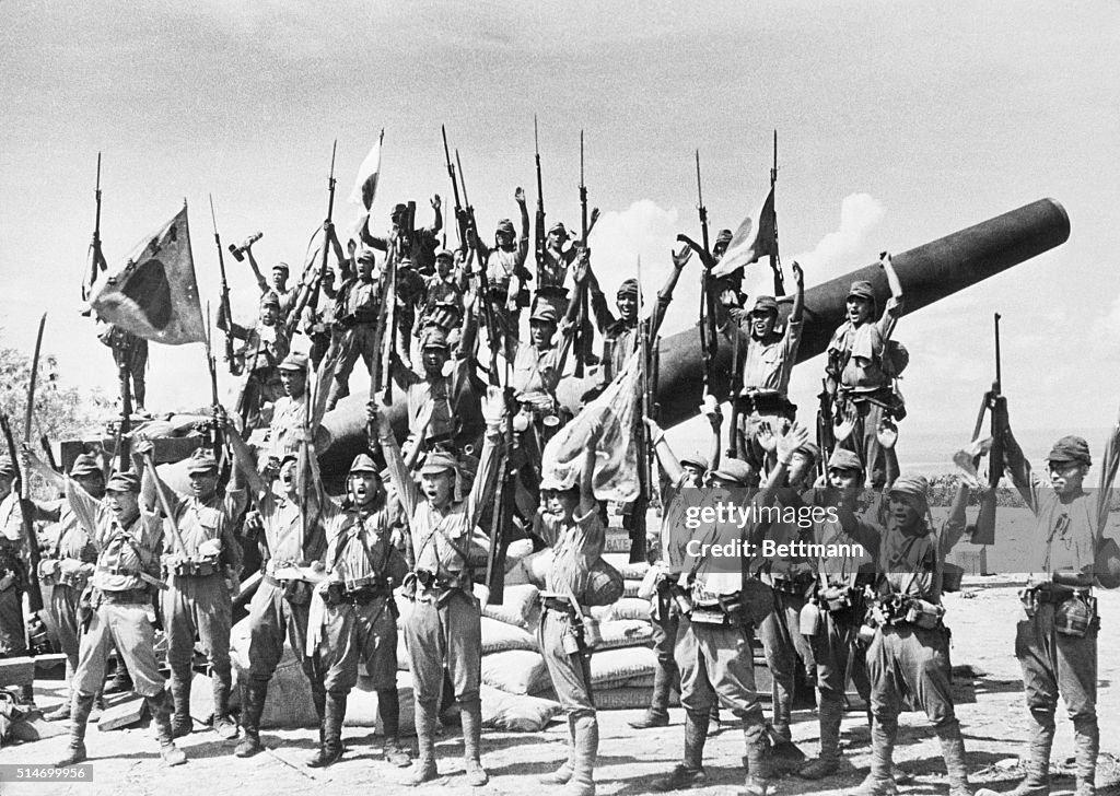 Japanese Soldiers on Captured American Gun