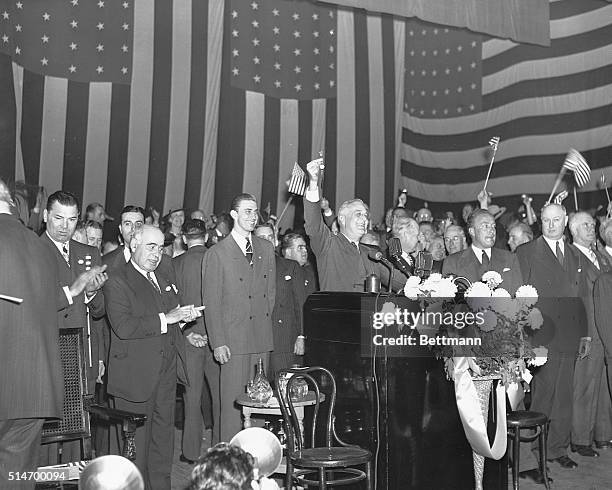 Franklin Roosevelt, running for a third term, appears at a campaign rally with Jack Dempsy, New York Governor Herbert Lehman, his son Franklin...